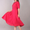 pink-womens-knee-length-dress-side-view.jpg Pink flared cotton kurti for women side view showing fit and flare design