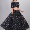 Flowy long skirt twirl shot of black floral off shoulder co-ord set